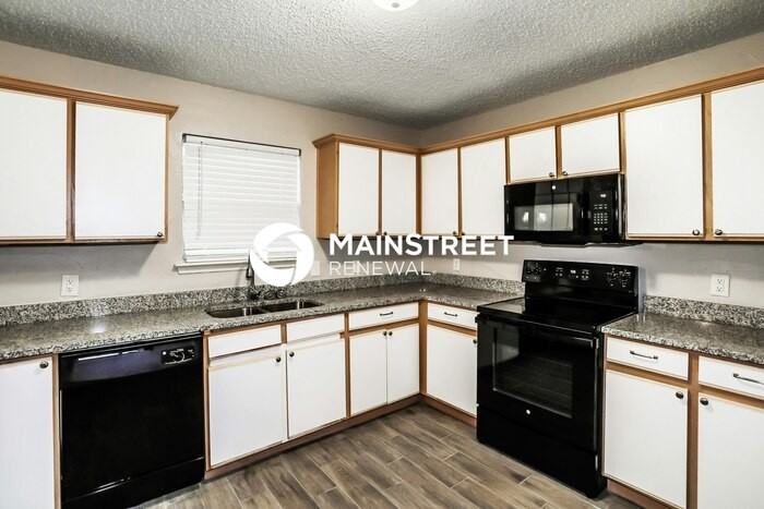 1120 Springcreek Dr - Photo 5 of 16