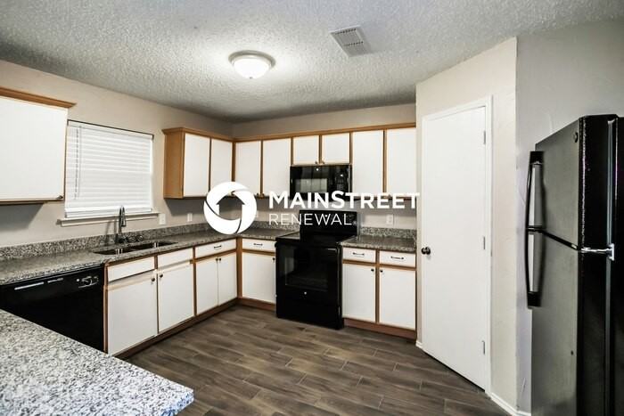 1120 Springcreek Dr - Photo 6 of 16