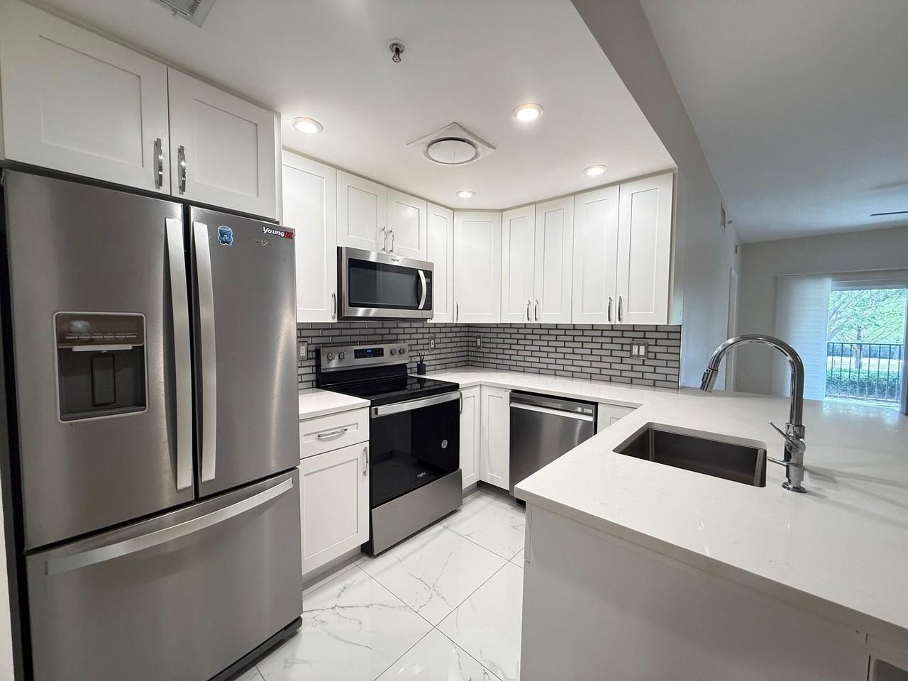 5860 W Sample Rd Apt 202 - Photo 3 of 26