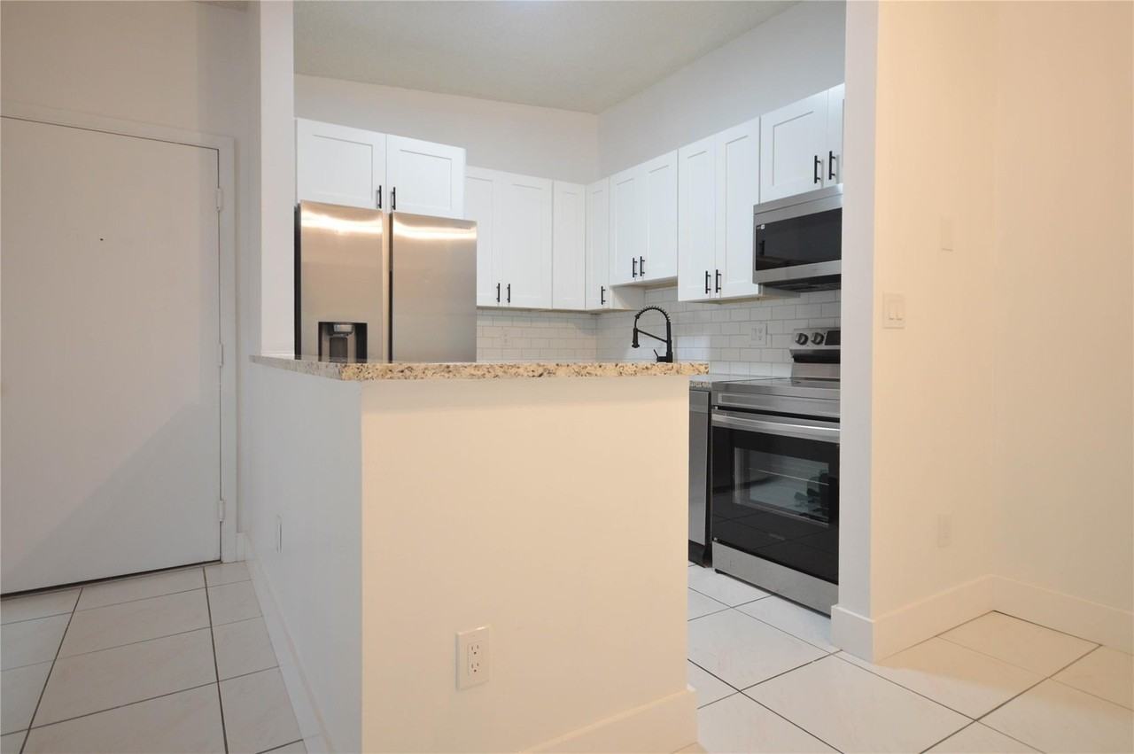 9499 W Mcnab Rd #208 - Photo 3 of 19