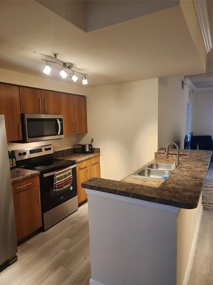 5880 W Sample Rd Apt 206 - Photo 4 of 34