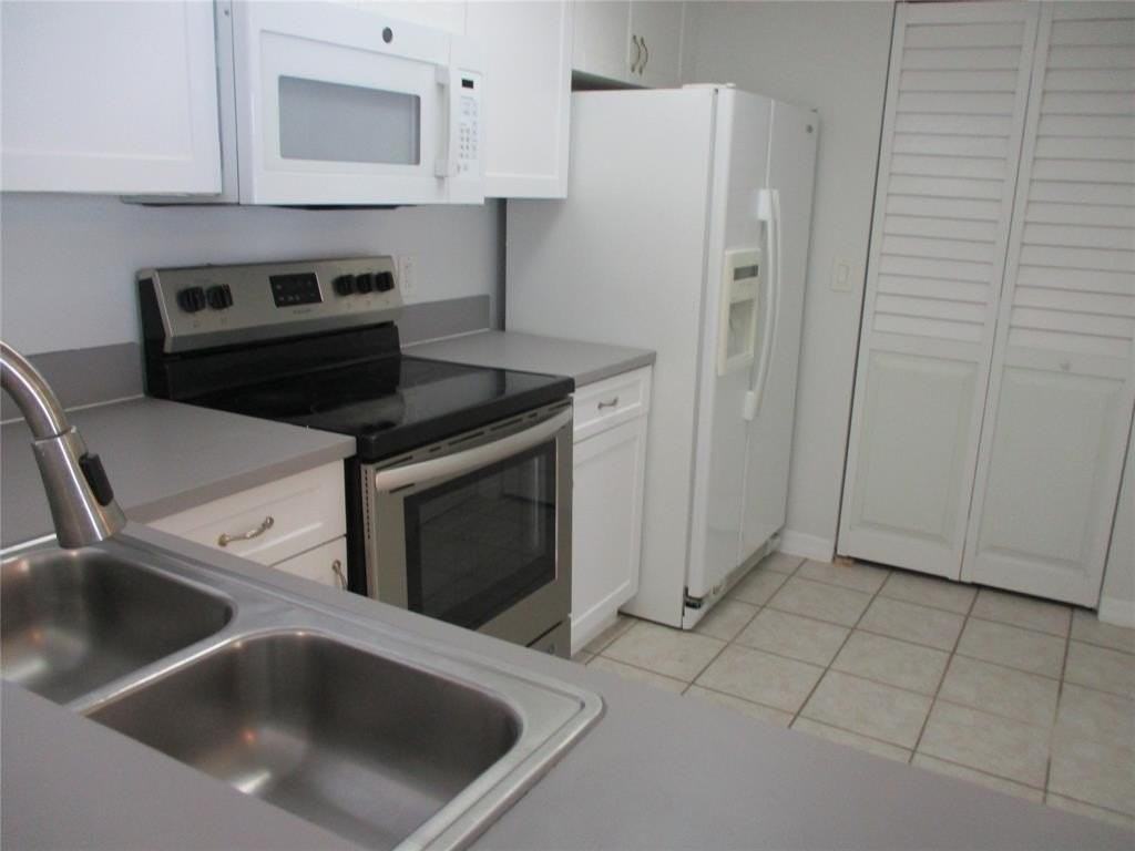 5045 Wiles Rd Apt 206 - Photo 7 of 24