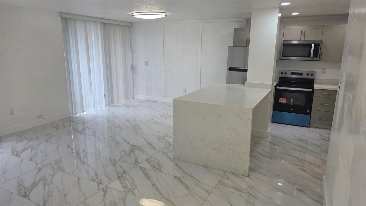 1758 Nw 55th Ave Apt 101 - Photo 2 of 13