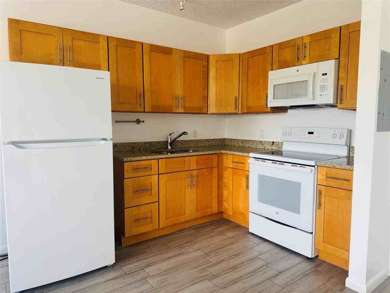 229 E Commercial Blvd #2 - Photo 5 of 8