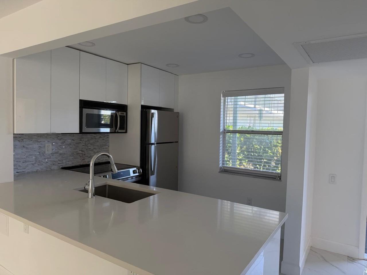 9301 Lime Bay Blvd #102 - Photo 7 of 27