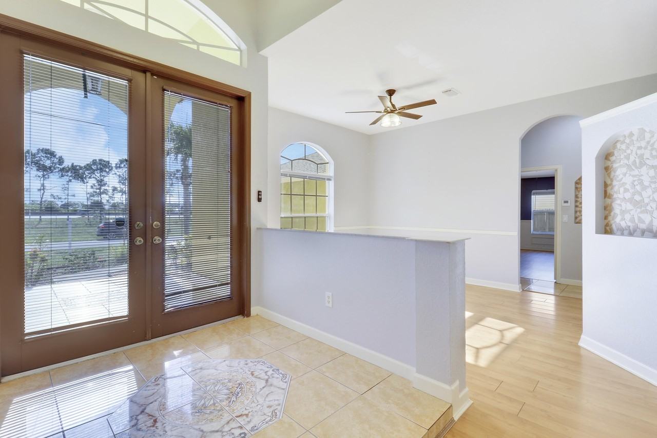 709 NW N Macedo Boulevard - Photo 5 of 39