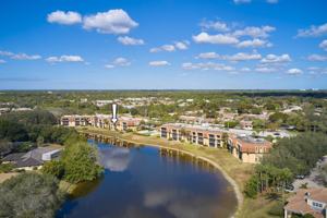 featured image of 5250 Woodland Lakes Dr #130