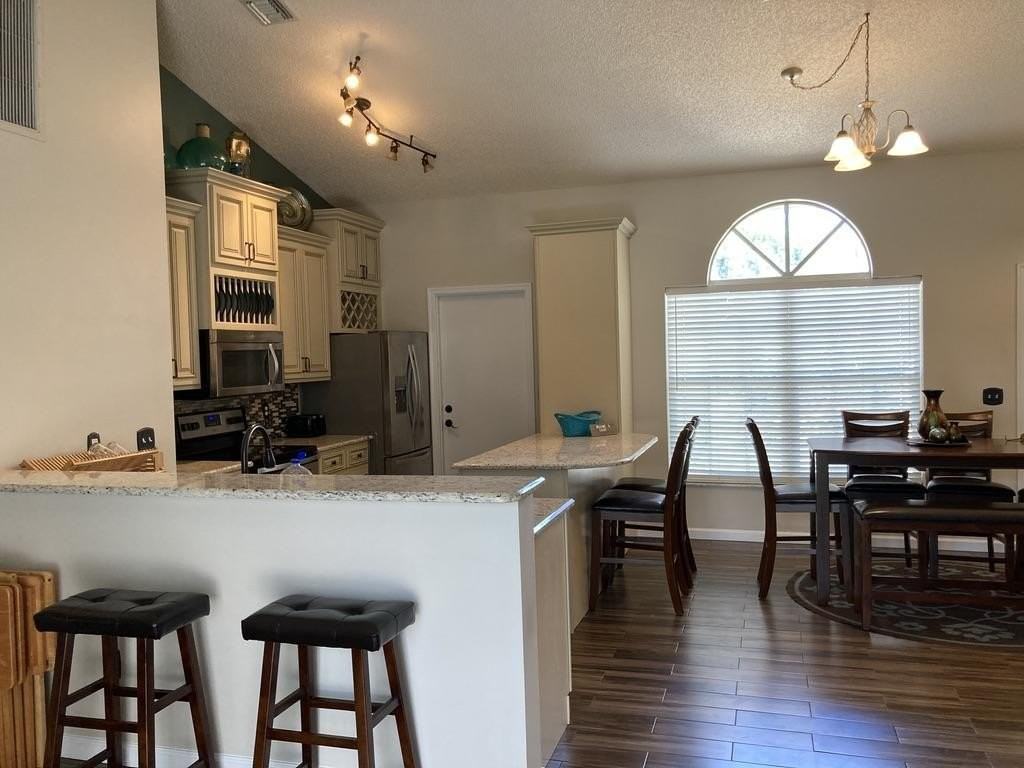 13016 Meadowbreeze Dr - Photo 3 of 26