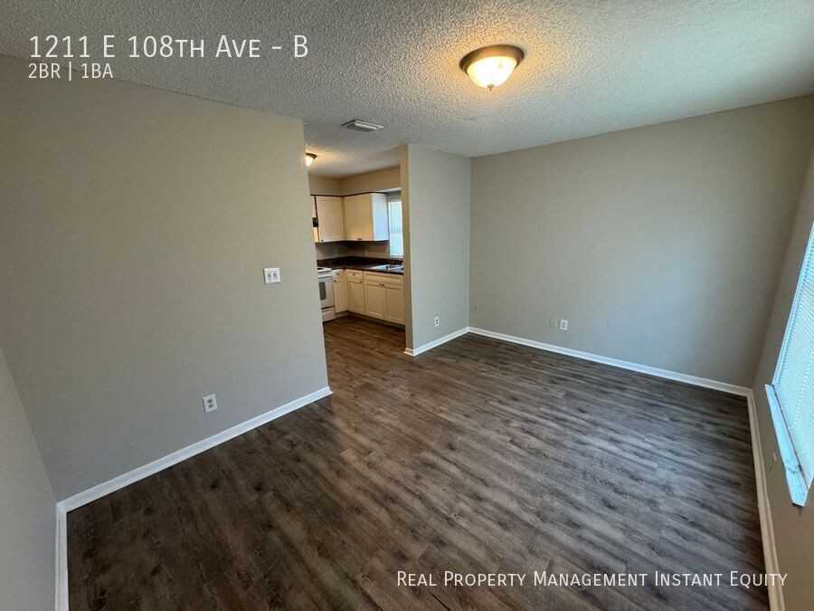 1211 E 108th Ave #B - Photo 2 of 12