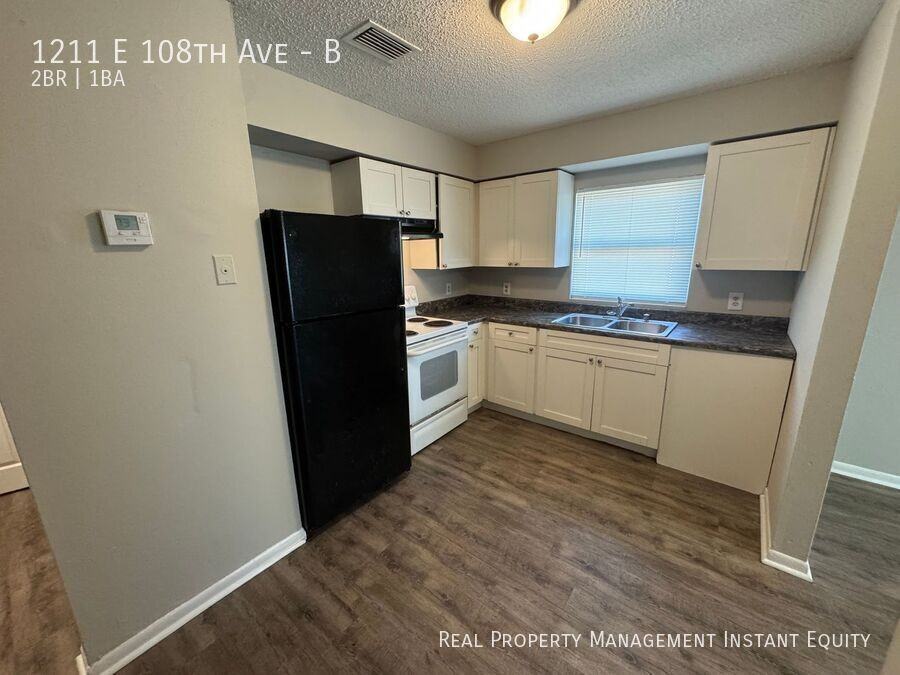 1211 E 108th Ave #B - Photo 4 of 12