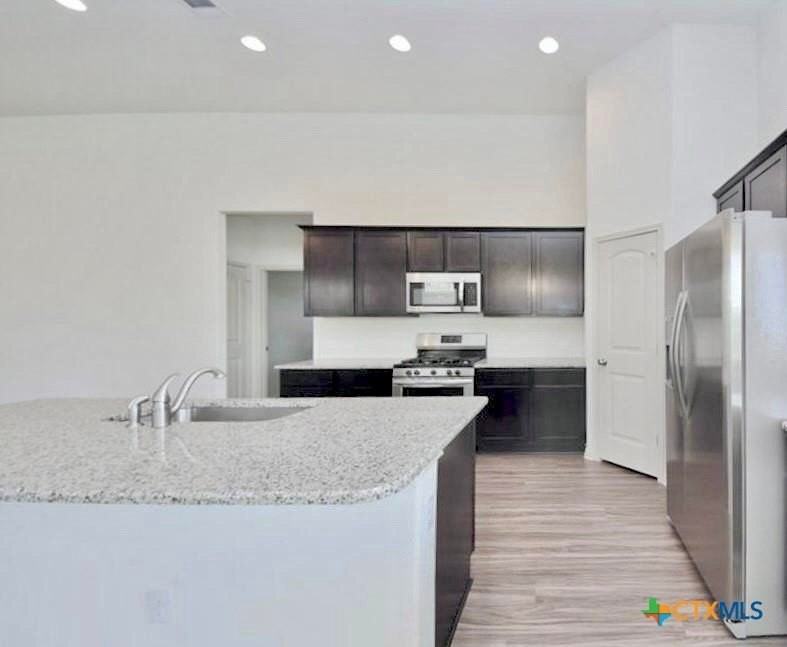 16829 Aventura Ave - Photo 4 of 34