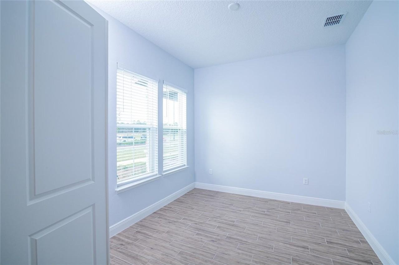 6487 Cyrils Dr - Photo 7 of 35