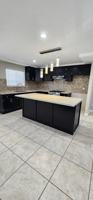 featured image of 10405 Anzac Ave #10405