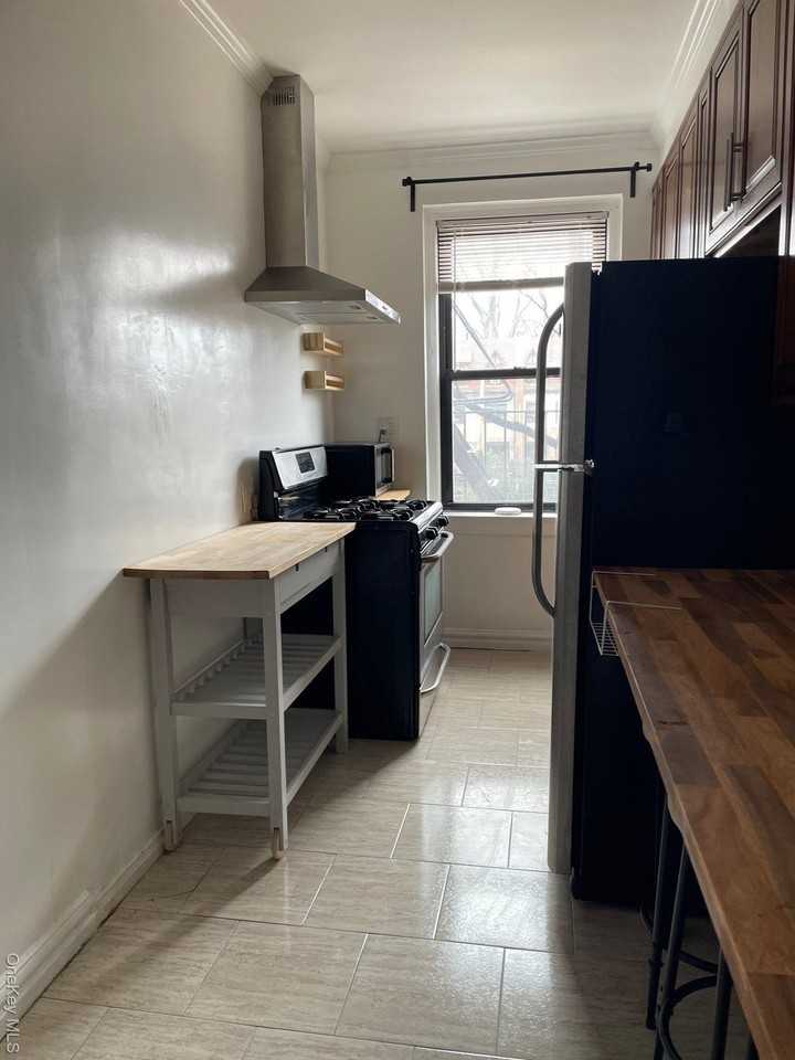 7720 Austin St Apt 2e - Photo 5 of 25