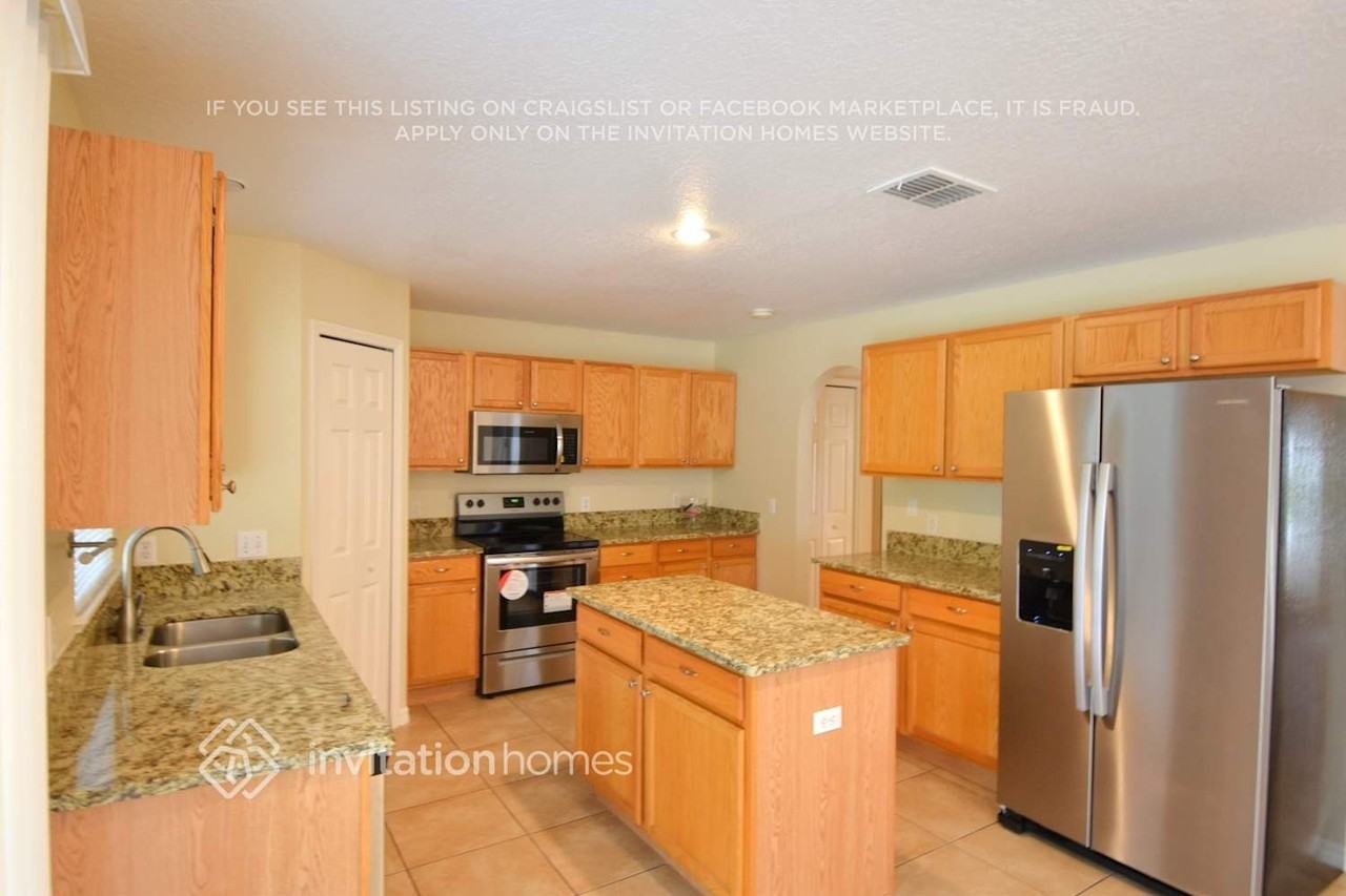 2553 Sw Grotto Cir - Photo 4 of 13