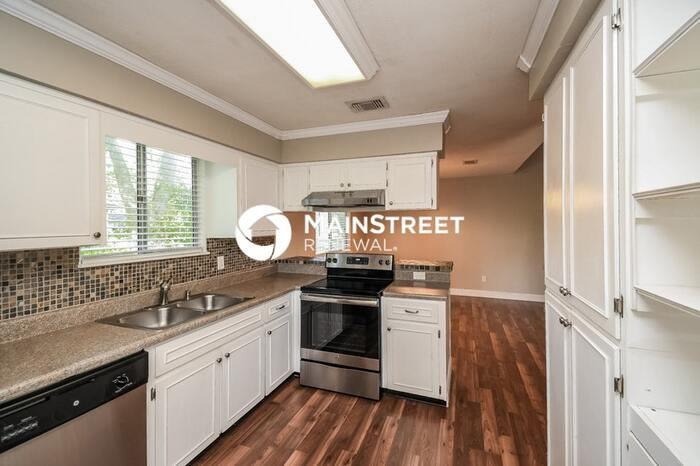 10927 Horse Track Dr E - Photo 7 of 16