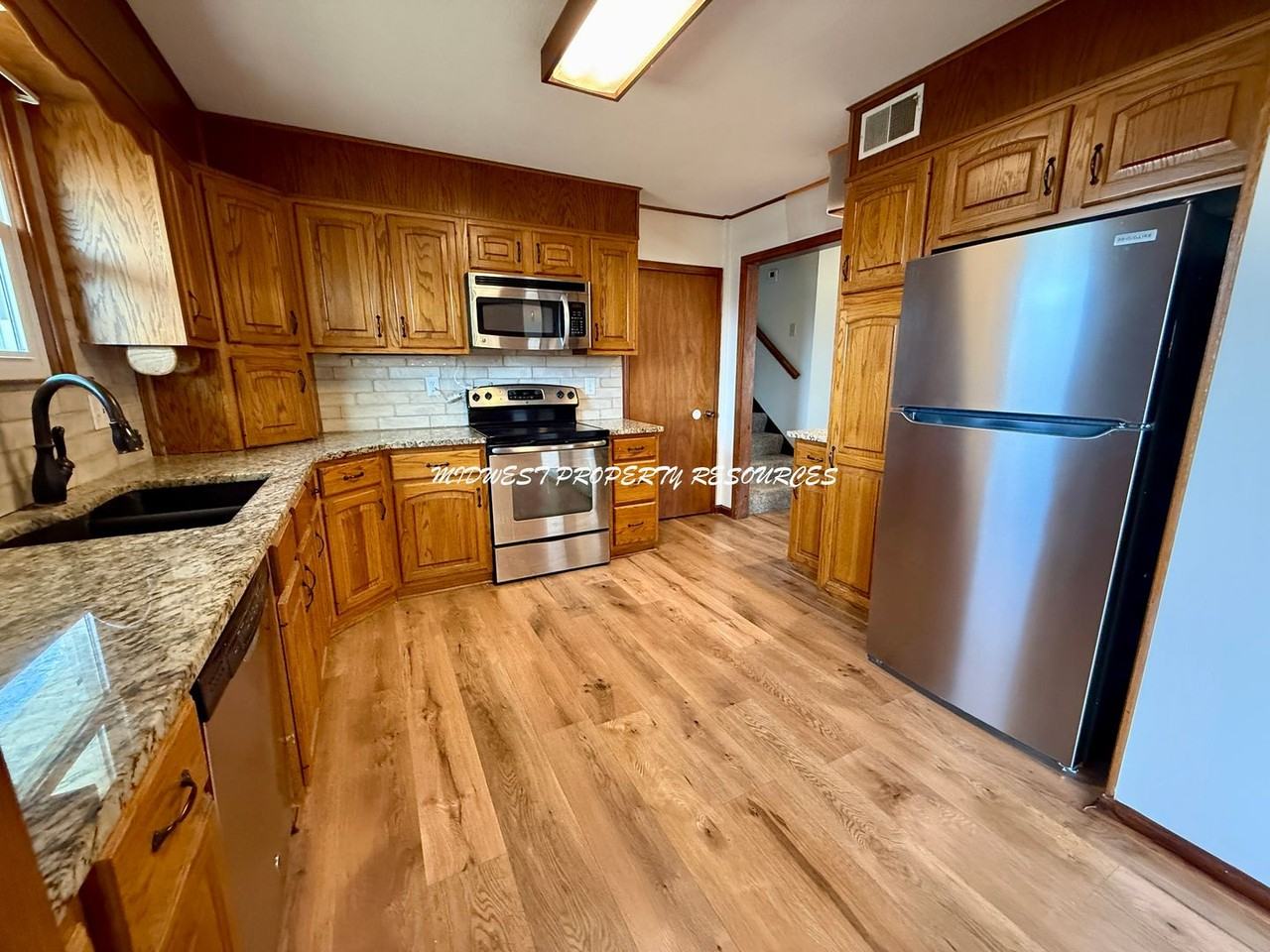 2203 Nw Chipman Rd - Photo 5 of 24