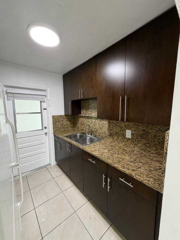 Tova Realty LLC - Photo 5 of 26