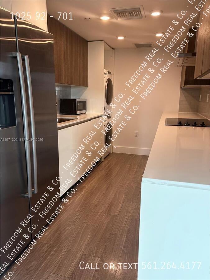 1025 92nd St #701 - Photo 3 of 6