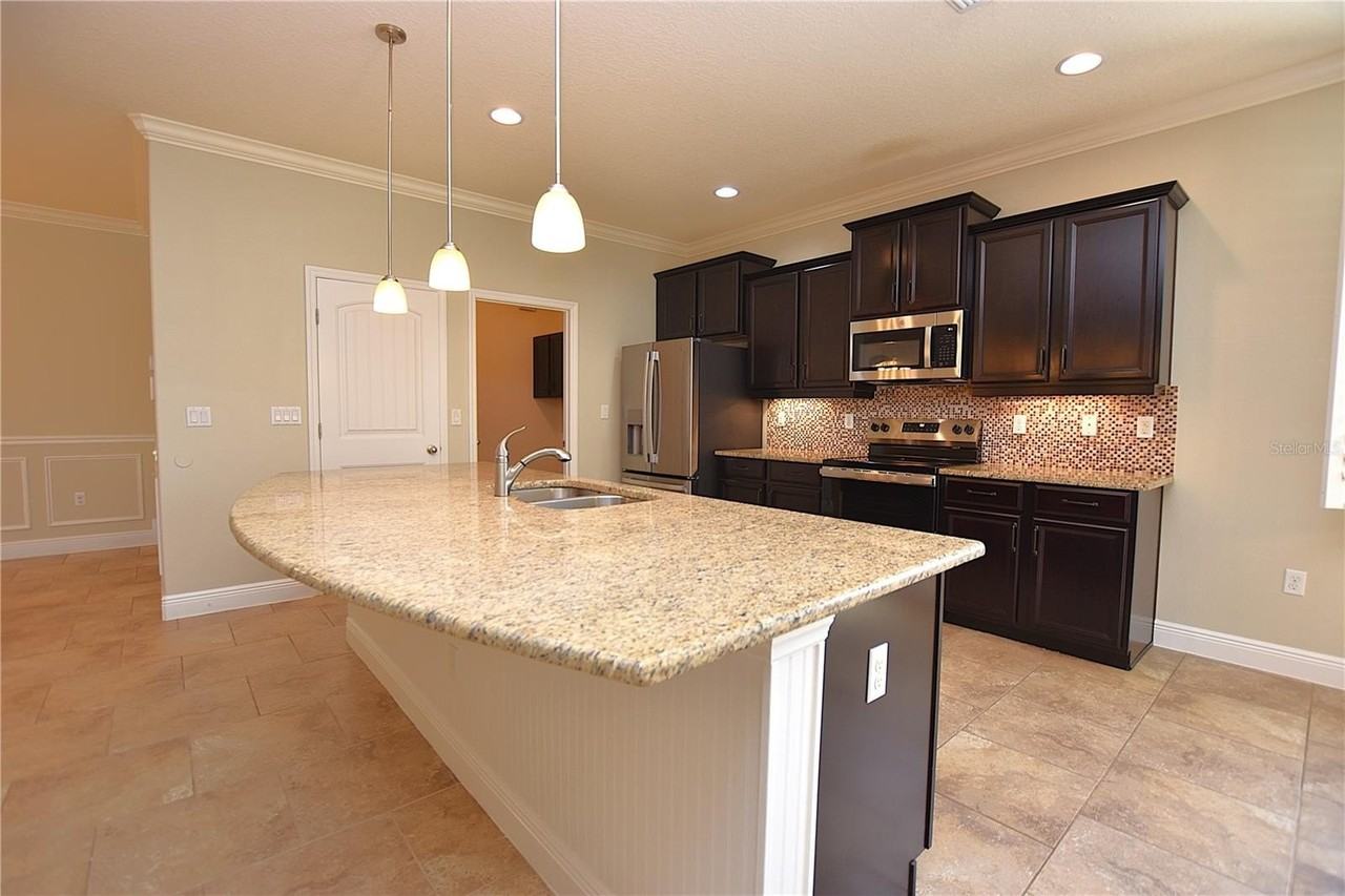 1977 Wind Meadows Dr - Photo 5 of 50