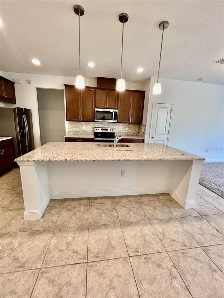 14815 Milfoil Ave - Photo 7 of 23