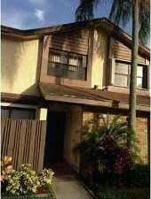 3961 Cocoplum Cir Apt F - Photo 2 of 45