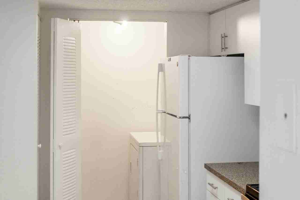 5065 Wiles Rd Apt 307 - Photo 3 of 35