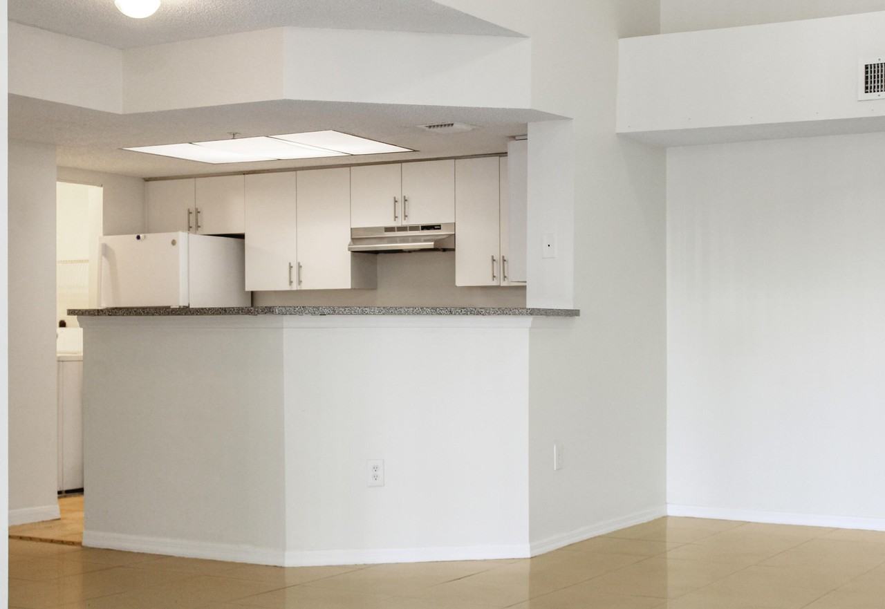 5065 Wiles Rd Apt 307 - Photo 4 of 35