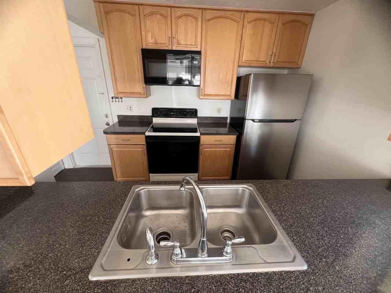 2201 Timberwood Cir N Unit 128 - Photo 3 of 6