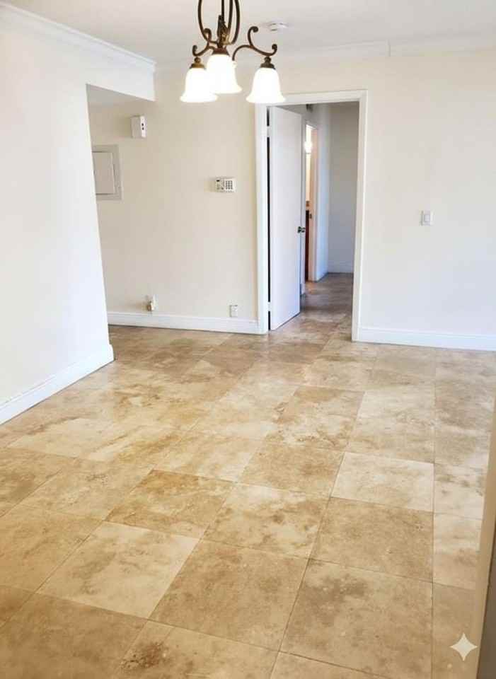 8721 Wiles Rd Apt 104 - Photo 6 of 30