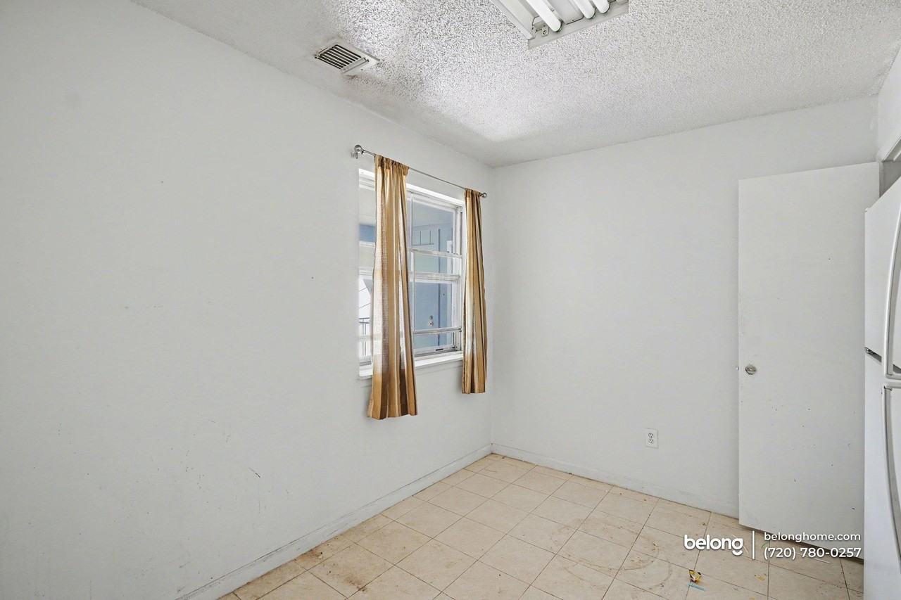 7260 S Gaylord St #L - Photo 2 of 18