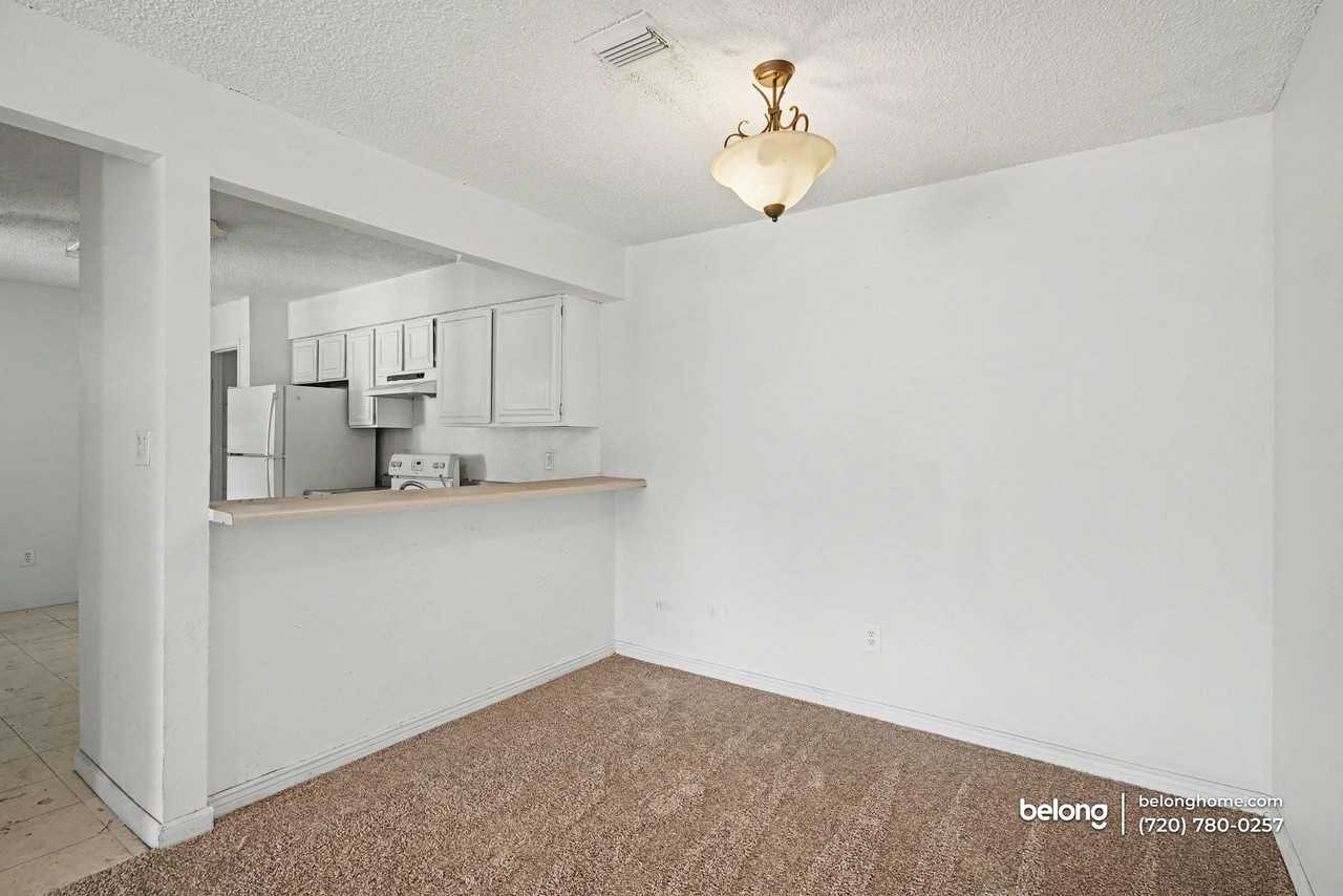 7260 S Gaylord St #L - Photo 4 of 18