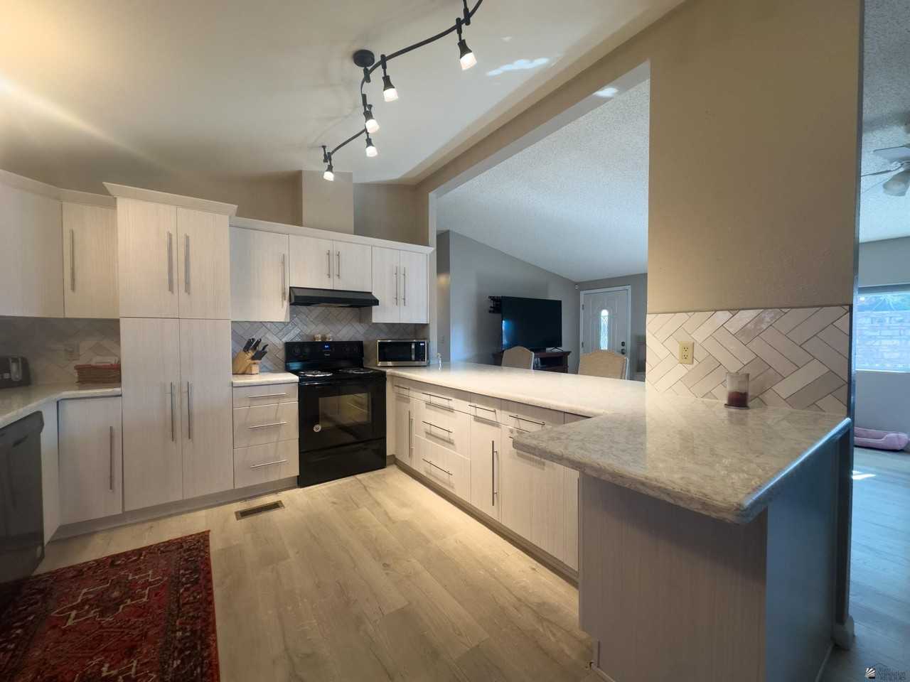 13239 E 49th Dr - Photo 5 of 28