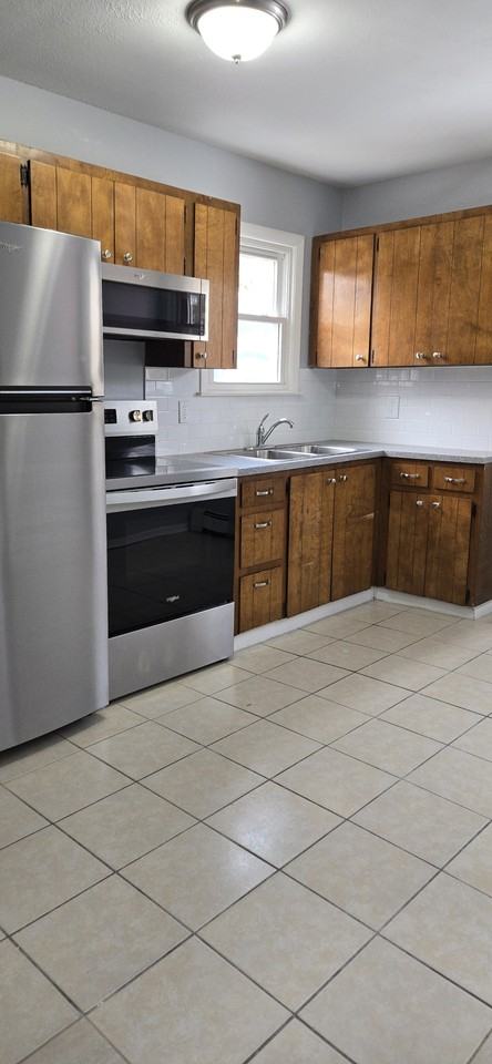 14360 Leonard Rd #1 - Photo 2 of 9