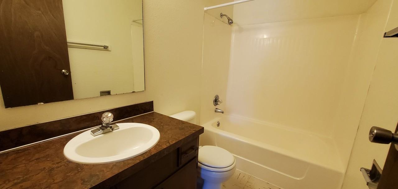 Spacious Apartments with Parking & Storage in Prime Location - Photo 3 of 27