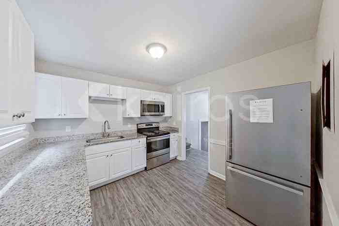 6537 Saint Louis St - Photo 7 of 29