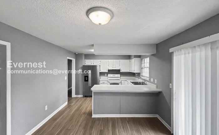 7012 Windcrest Ln - Photo 2 of 25