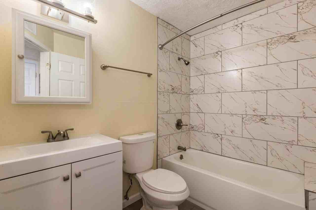 CRESTWOOD APARTMENTS - Photo 7 of 13