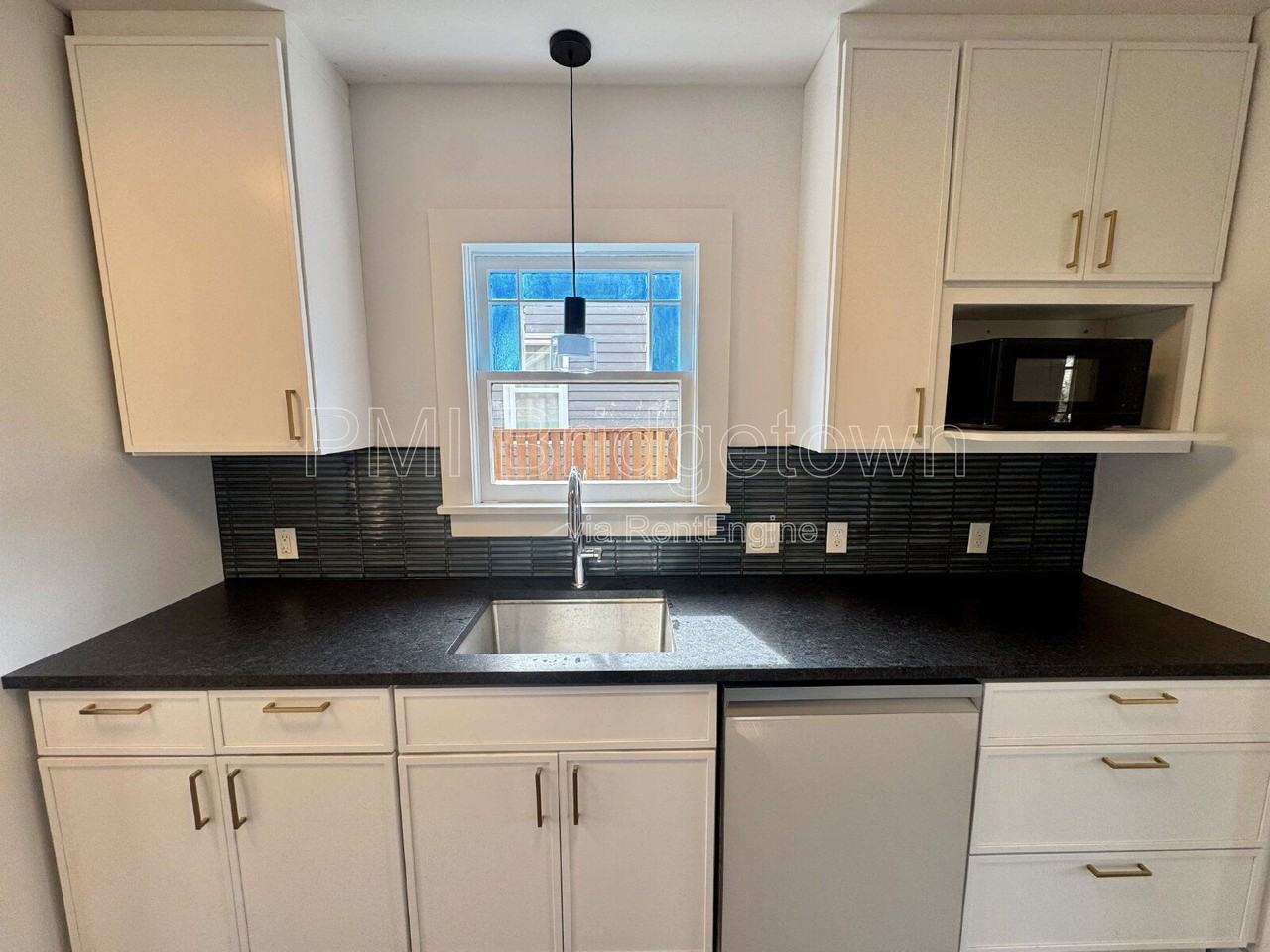 7300 N Mobile Ave - Photo 7 of 30