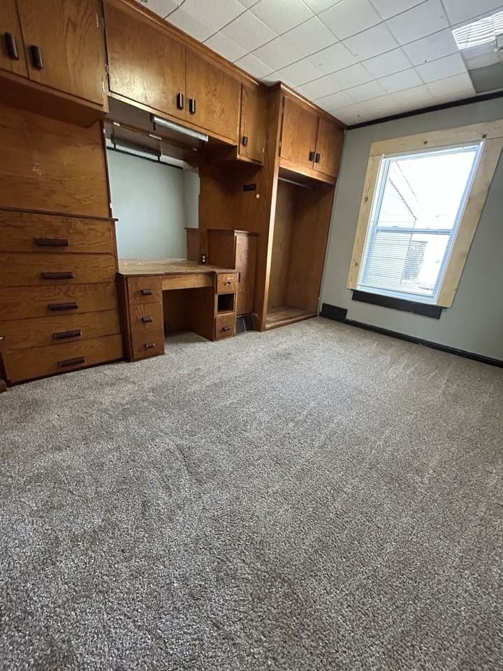 112 W 23rd St - Photo 7 of 15