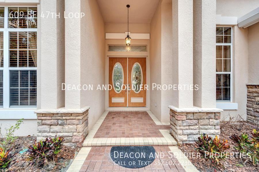 609 Se 47th Loop - Photo 2 of 50