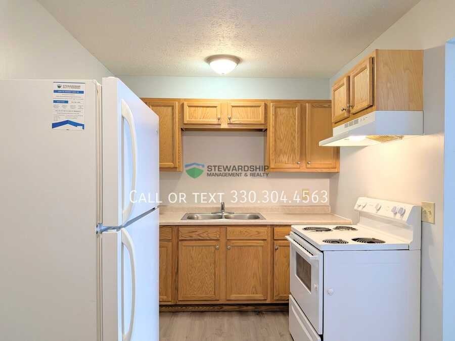 7253 Hills And Dales Rd Nw #9 - Photo 2 of 21