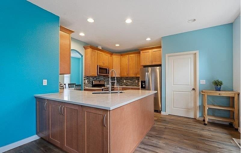 7407 Everwood Street Northeast - Photo 6 of 16