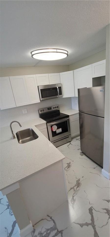 2771 Riverside Dr Apt 416-A - Photo 3 of 25