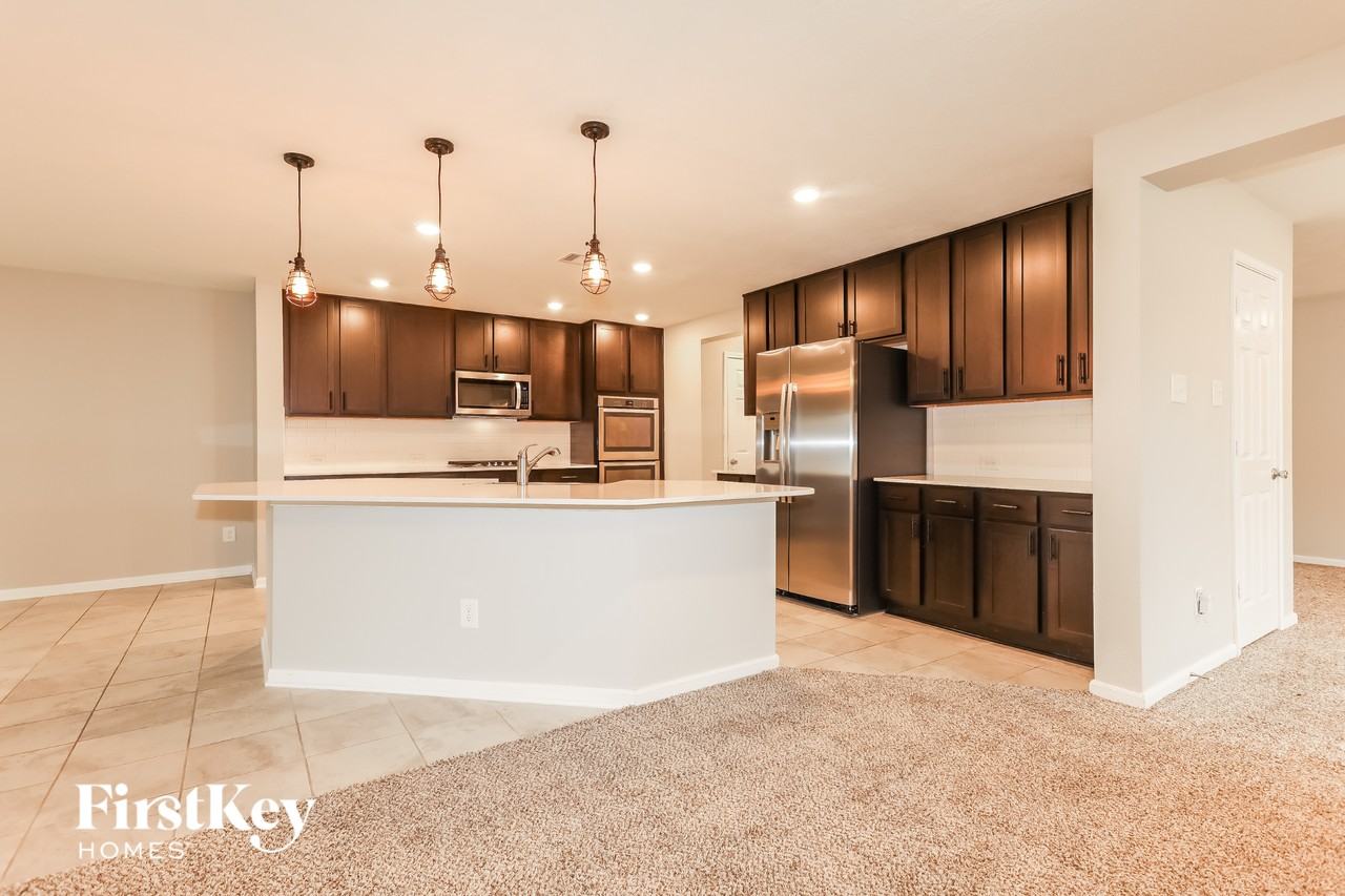 14250 Persimmon Woods Dr - Photo 5 of 15