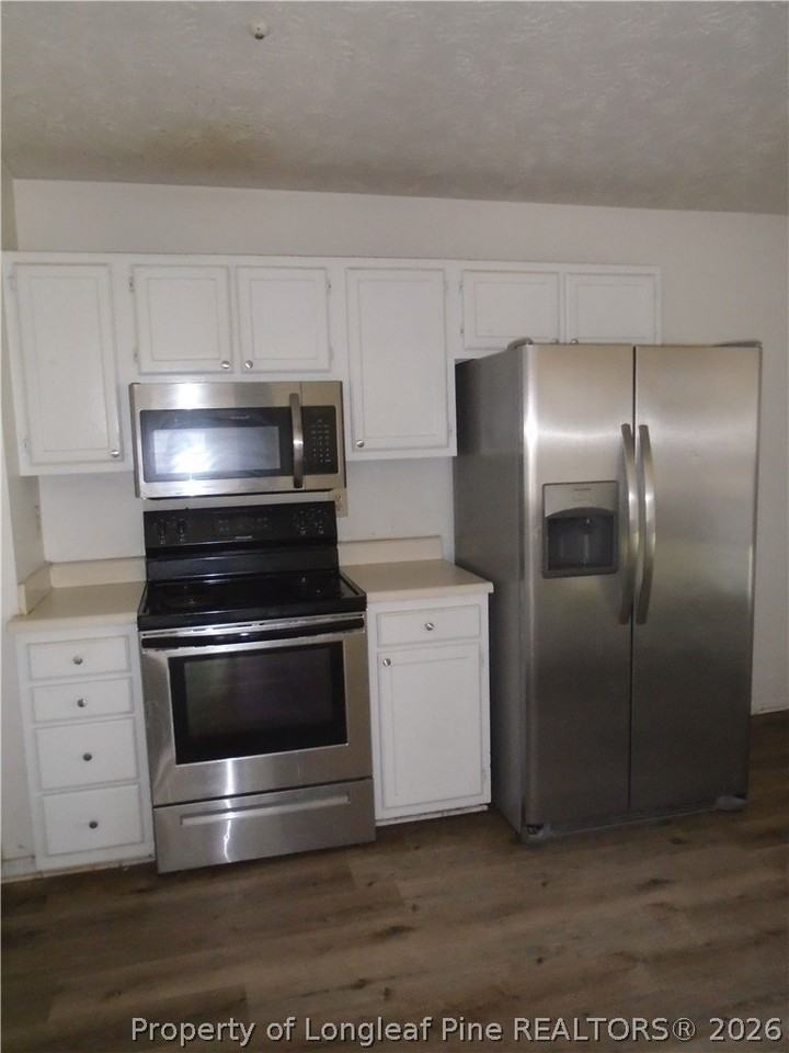 5595 Quietwood Pl - Photo 5 of 19