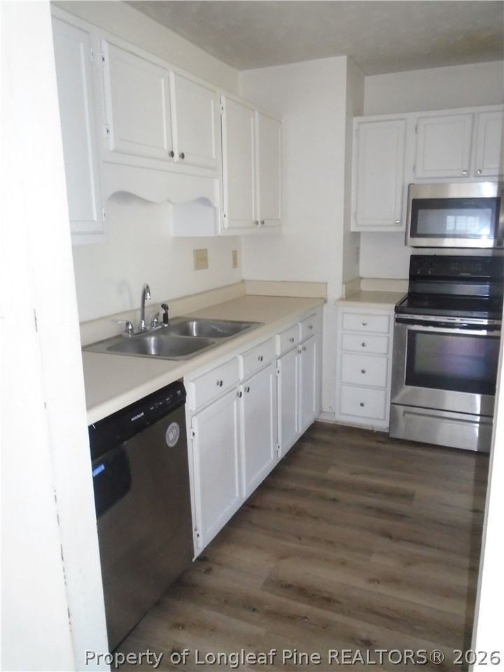 5595 Quietwood Pl - Photo 6 of 19