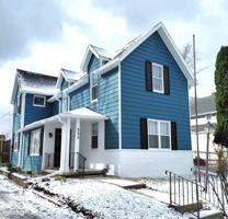 featured image of 335 W 4th St