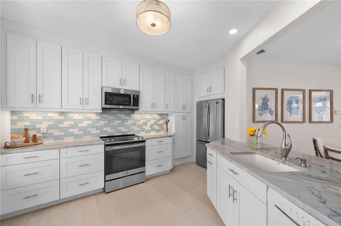 8735 Lakeside Blvd Apt 210 - Photo 7 of 21