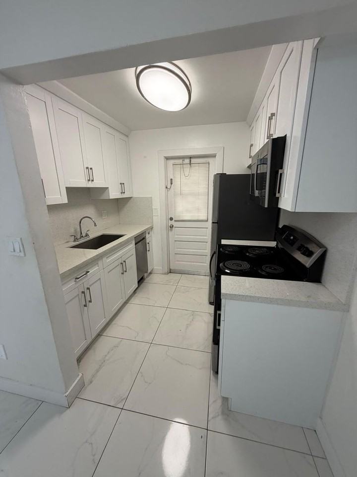 Tova Realty LLC - Photo 4 of 33
